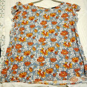 Feminine ruffle cap sleeve blouse floral.